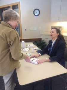 Author Elizabeth Fenn takes time to sign a few books after the Friends Annual Meeting